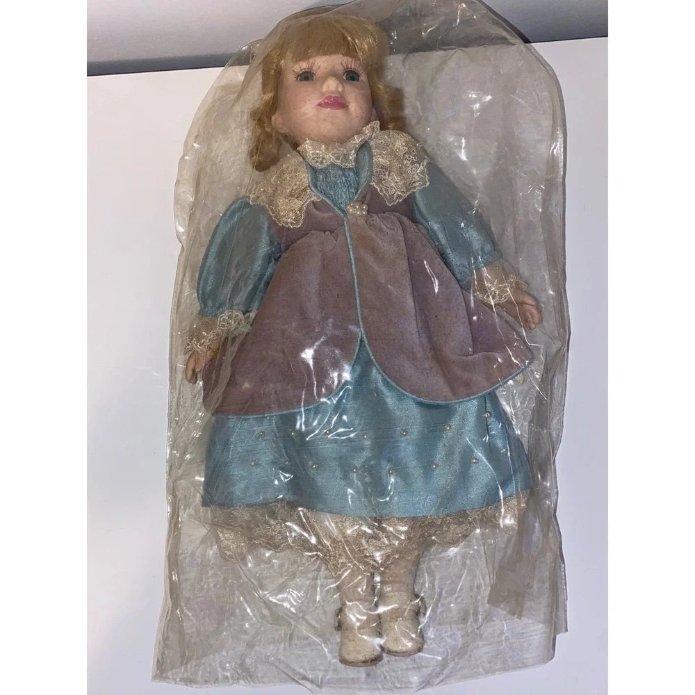 Brass Key Porcelain‎ Doll